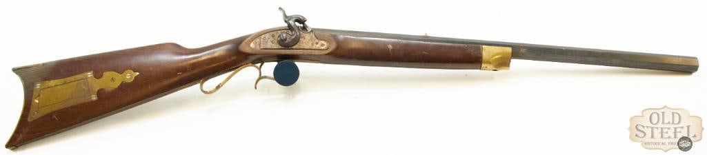 F.I.E. Arms Percussion Rifle - .45 Caliber: Offered here is this FIE black powder .45cal percussion rifle. The rifle's patina is developed, and there are areas where the finish is worn or the stock has some scratches or dings. Nevertheless, the