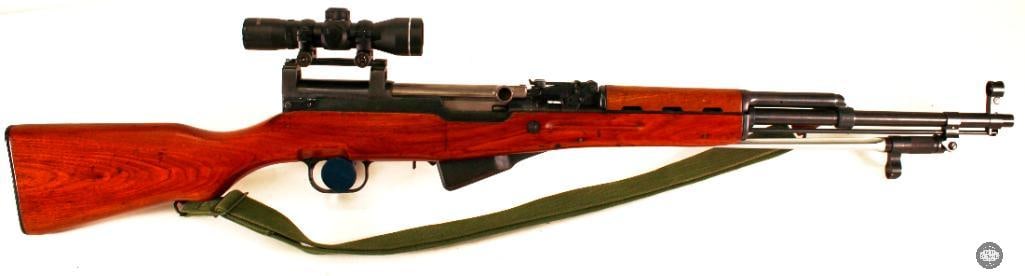 Norinco Type 56 SKS with Sling - 7.62x39: Check out this sweet Scoped Type 56 SKS from Norinco! This rifle has a smooth action and great, snappy controls. It features an AIM 4x30 scope on a risen mount. The optic setup allows for quick switch