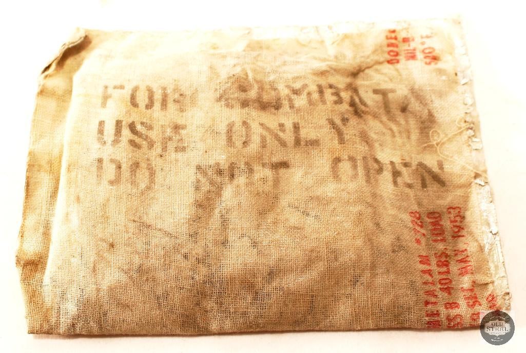 Korean War 30 Carbine Ammunition in Original Combat Packaging 50rds: FOR COMBAT USE ONLY DO NOT OPEN written on one side of this 50rd pack of 30 Carbine ammunition from May 1953. Still sealed. THIS ITEM IS AS PICT
