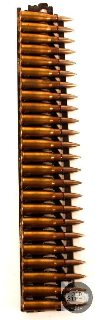 24rds 8mm French Lebel Ammunition on Rack: A rack of 24rds 8mm Lebel ammunition. THIS ITEM IS AS PICTURED WITH NO FURTHER ATTACHMENTS. ALL SALES ARE FINAL. PLEASE REFER TO THE AUCTION DESCRIPTI