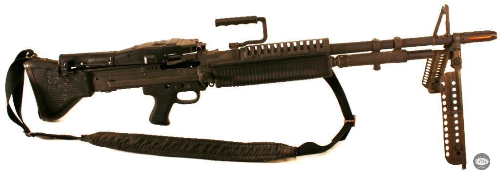 M60 Machine Gun Display – Featuring Original Parts: Own a striking piece of military history with this M60 Machine Gun Display, meticulously assembled using original parts to capture the iconic presence of this legendary firearm. Known as the "Pig" by 