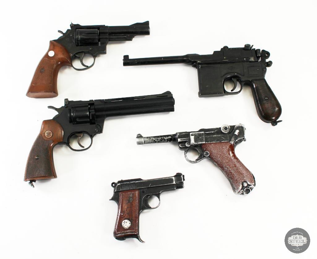 Assorted Model Pistols and Revolvers: Assorted lot of model pistols and revolvers with one Crossman airgun revolver. THIS ITEM IS AS PICTURED WITH NO FURTHER ATTACHMENTS. ALL SALES ARE FIN
