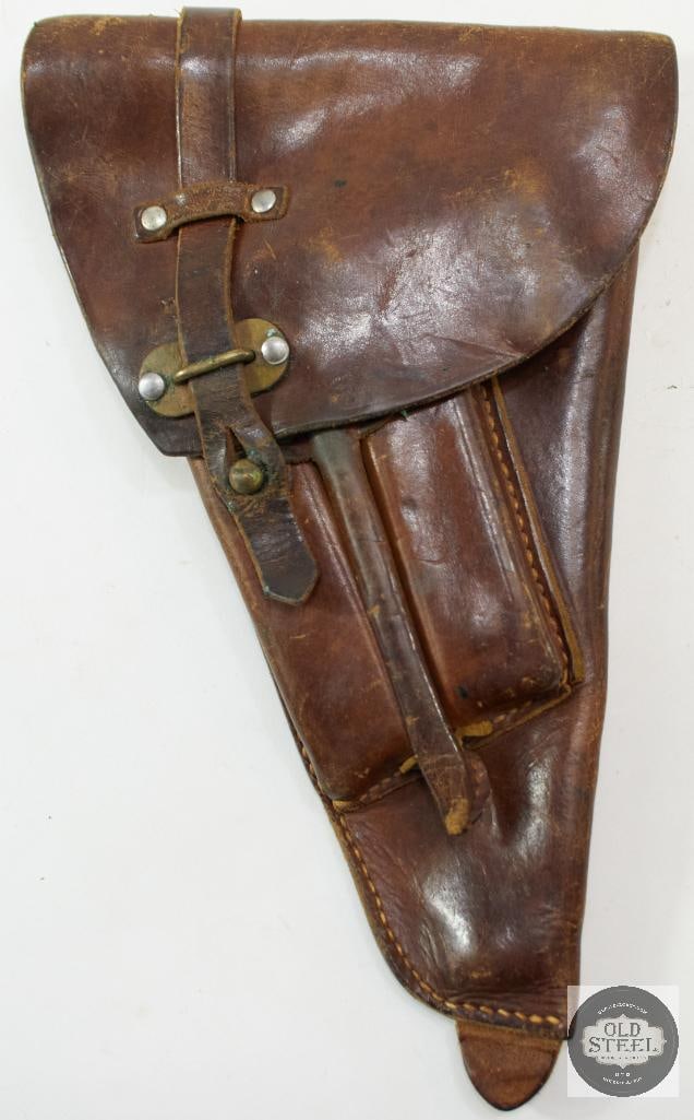 Swedish M40 Leather Holster for Lahti Pistol: This lot contains a Swedish M4 leather holster intended for use with the Lahti pistol. This holster features two front-mounted magazine pouches. THIS