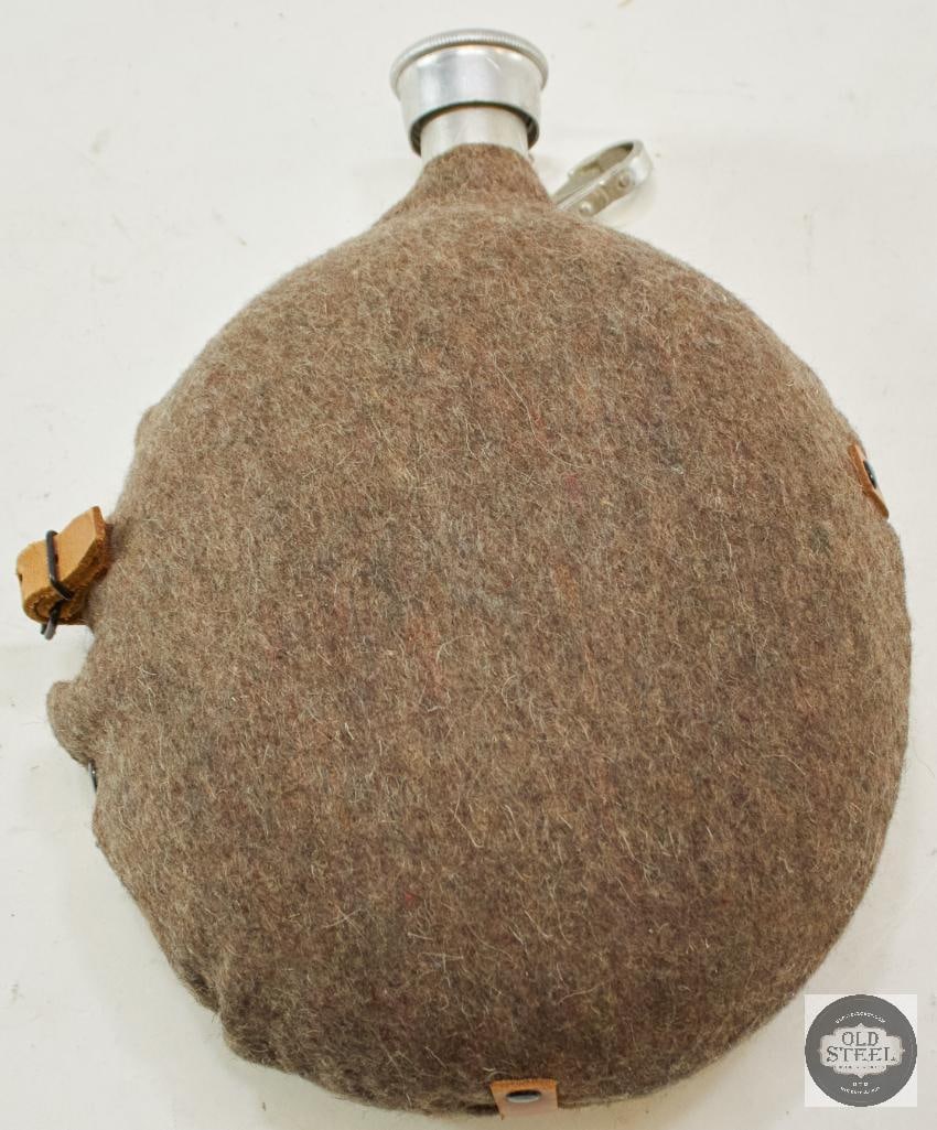 German Aluminum Canteen and Cover WWII Style: German Aluminum Canteen and Cover WWII Style THIS ITEM IS AS PICTURED WITH NO FURTHER ATTACHMENTS. ALL SALES ARE FINAL. PLEASE REFER TO THE AUCTION DE