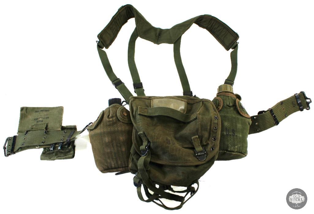 US Army Pistol Belt Rig with Pouches and Canteens: Pistol belt rig from the US Army with pouches and canteens. M1956 shoulder harness. THIS ITEM IS AS PICTURED WITH NO FURTHER ATTACHMENTS. ALL
