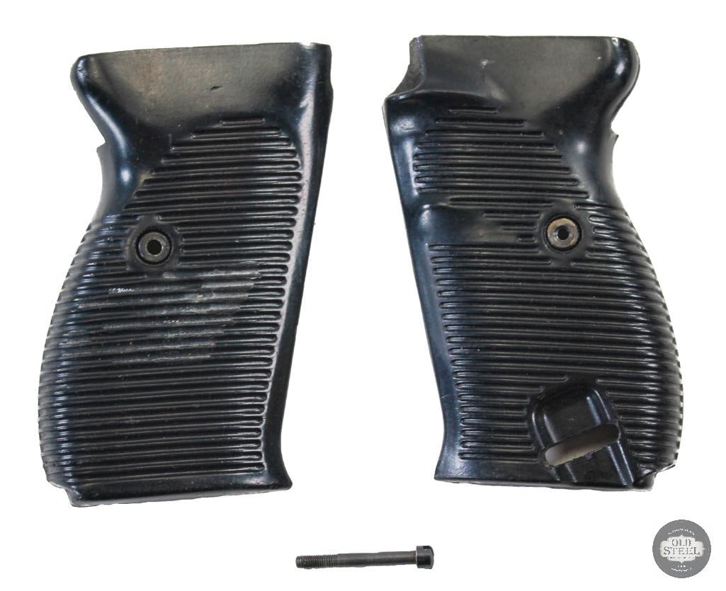 P-38 Black Grip Panels W-11: Black grips for the P-38 pistol. Bushing and grip screw included. Inside marked by hand with W-11 and WAA. THIS ITEM IS AS PICTURED WITH NO FURTHER AT