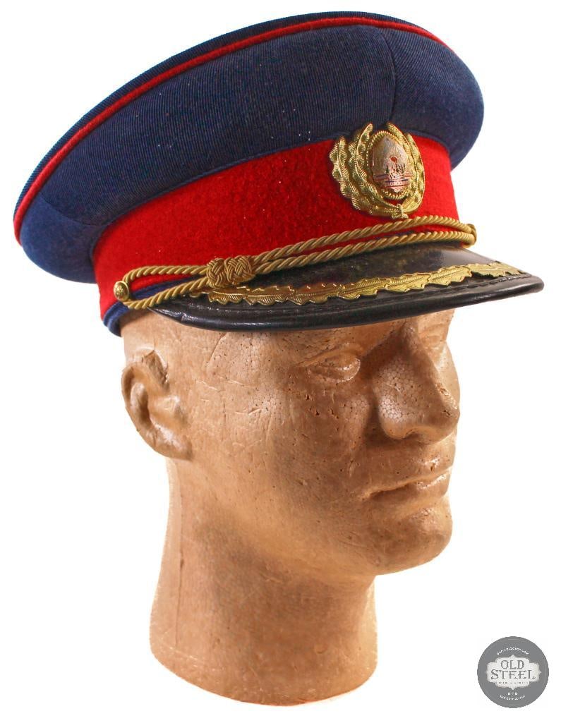 Socialist Romania Parade Officer's Visor Cap - 56 - Romania: Available for bidding is a Socialist Romania Parade Officer's Visor Cap . The size is 56. THIS ITEM IS AS PICTURED WITH NO FURTHER ATTACHMENTS. ALL SA
