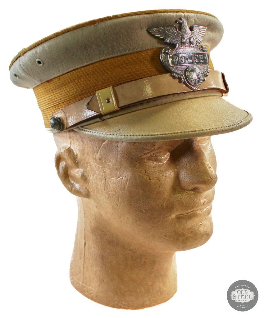 Vintage Iowa Police Visor with Names: Featured in this lot is a Vintage Iowa Police Visor with various names or other faded writings on the underside. There are many faded names and/or other writings written on the inside. 