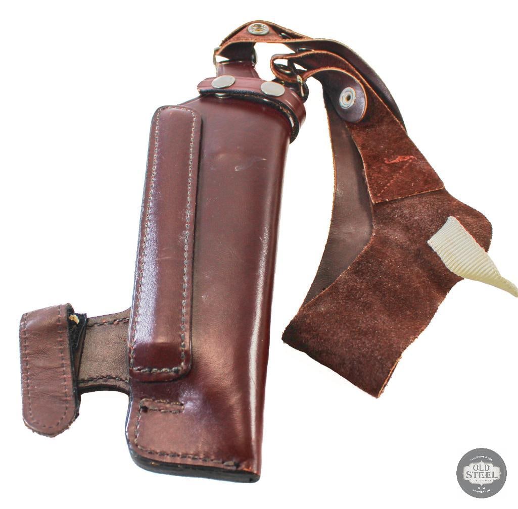 Leather Shoulder Holster: Leather Shoulder Holster. Looks to take a 5 to 6 inch barreled revolver. THIS ITEM IS AS PICTURED WITH NO FURTHER ATTACHMENTS. ALL SALES ARE FIN