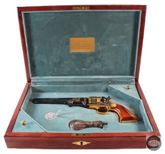 Robert E. Lee Commemorative 1851 Navy Percussion Revolver by the U.S. Historical Society - Antique: This well-made reproduction of a Colt Model 1851 Navy revolver is serial numbered 1969 and is .36 caliber with a 7.5 octagonal barrel.&nbsp;The metal is gold electro-plated with scrollwork on the fram