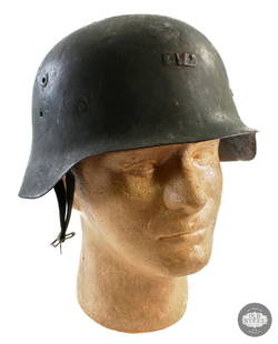 Spanish M42 Helmet: Spanish M42 helmet. Liner and partial chinstrap. &nbsp;  THIS ITEM IS AS PICTURED WITH NO FURTHER ATTACHMENTS. ALL SALES ARE FINAL. PLEASE REFER TO THE AUCTIO