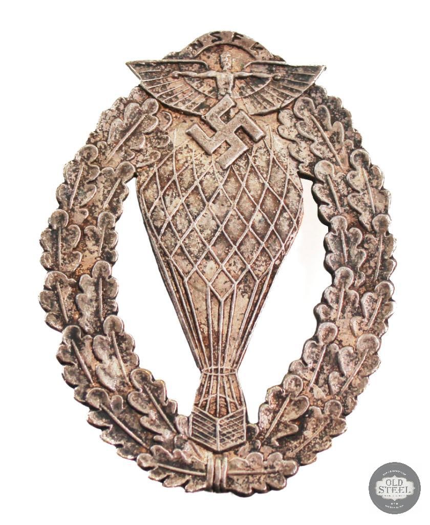 Original NSFK Balloonist Pilot Badge - WWII German: Original NSFK Balloonist Pilot Badge - WWII German THIS ITEM IS AS PICTURED WITH NO FURTHER ATTACHMENTS. ALL SALES ARE FINAL. PLEASE REFER TO THE AUCT