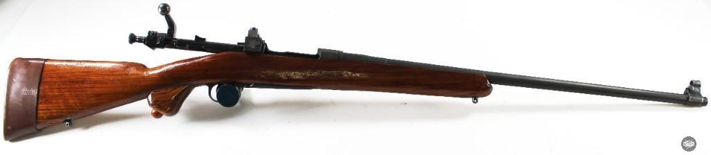 Remington Model 1903-A3 Sporter .30-06 SPRG 1942 - C&R: Here we have a Remington 1903-A3 sporterized rifle chambered in 30-06 Sprg. The rifle has some optic base holes drilled and tapped into the receiver ring. Installed at the rear of the receiver is an a