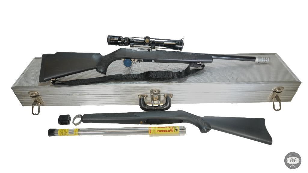 Ruger 10-22 Rifle 22LR Tasco 3-9x40 Scope w/ Case, Spare BBL and Stock - FFL: The next rifle on offer is the classic, ever prevalent Ruger 10-22 in 22LR. This rifle is in great condition with a heavier barrel with a brake, a Tasco scope with 3-9x40 specs and a nylon sling. This
