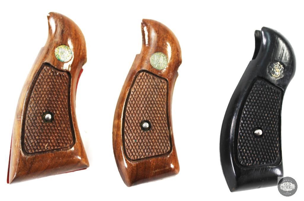 Lot of 3 Smith & Wesson Wooden Small Frame Revolver Grips: Lot of 3 Smith & Wesson Wooden Small Frame Revolver Grips THIS ITEM IS AS PICTURED WITH NO FURTHER ATTACHMENTS. ALL SALES ARE FINAL. PLEASE REFER
