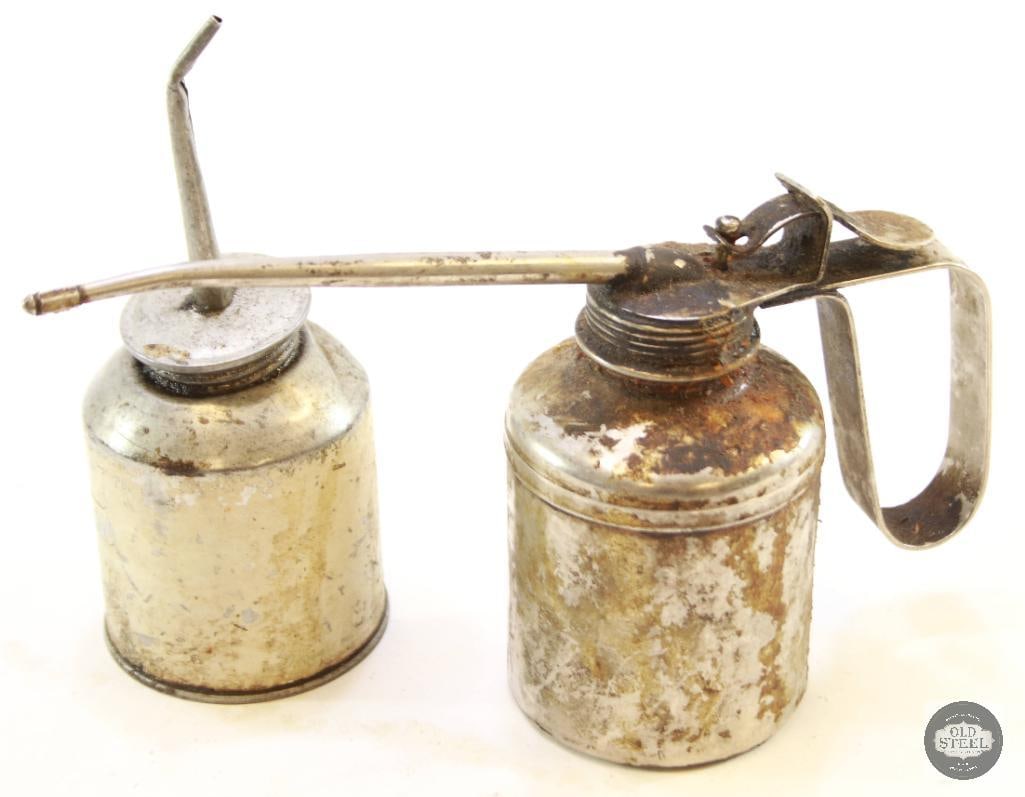 Lot of Two Vintage Automotive Oilers:  Lot of two vintage automotive oilers. These classic tools are ideal for collectors of automotive memorabilia or enthusiasts seeking authentic, functional vintage equipment. &nbs