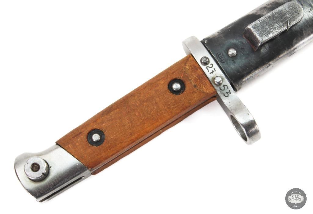 Austrian M1895 Bayonet and Scabbard: Being auctioned next is an nice M1895 Austrian bayonet with its scabbard. OE WG on the ricasso and 27 53 engraved by hand on the guard. MO circled at the top of the scabbard. 