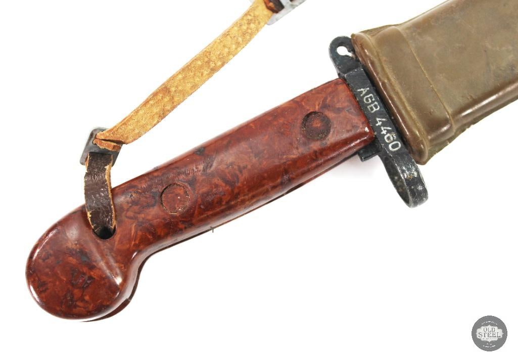 AKM Type I Bayonet with Scabbard: AKM Type I Bayonet with matching wire cutting scabbard. Appears to be Romanian THIS ITEM IS AS PICTURED WITH NO FURTHER ATTACHMENTS. ALL SALES ARE FI