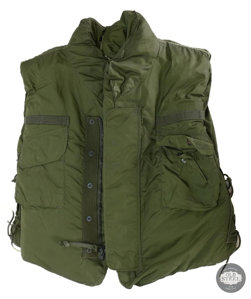 U.S. M69 Fragmentation Protective Vest (3/4 Collar variant): Armor, Body Fragmentation Protective Vest with 3/4 Collar NSN: 8470-823-7373 DSA-100-4994 Size: X-Large Olive drab nylon outer shell with protective flaps and