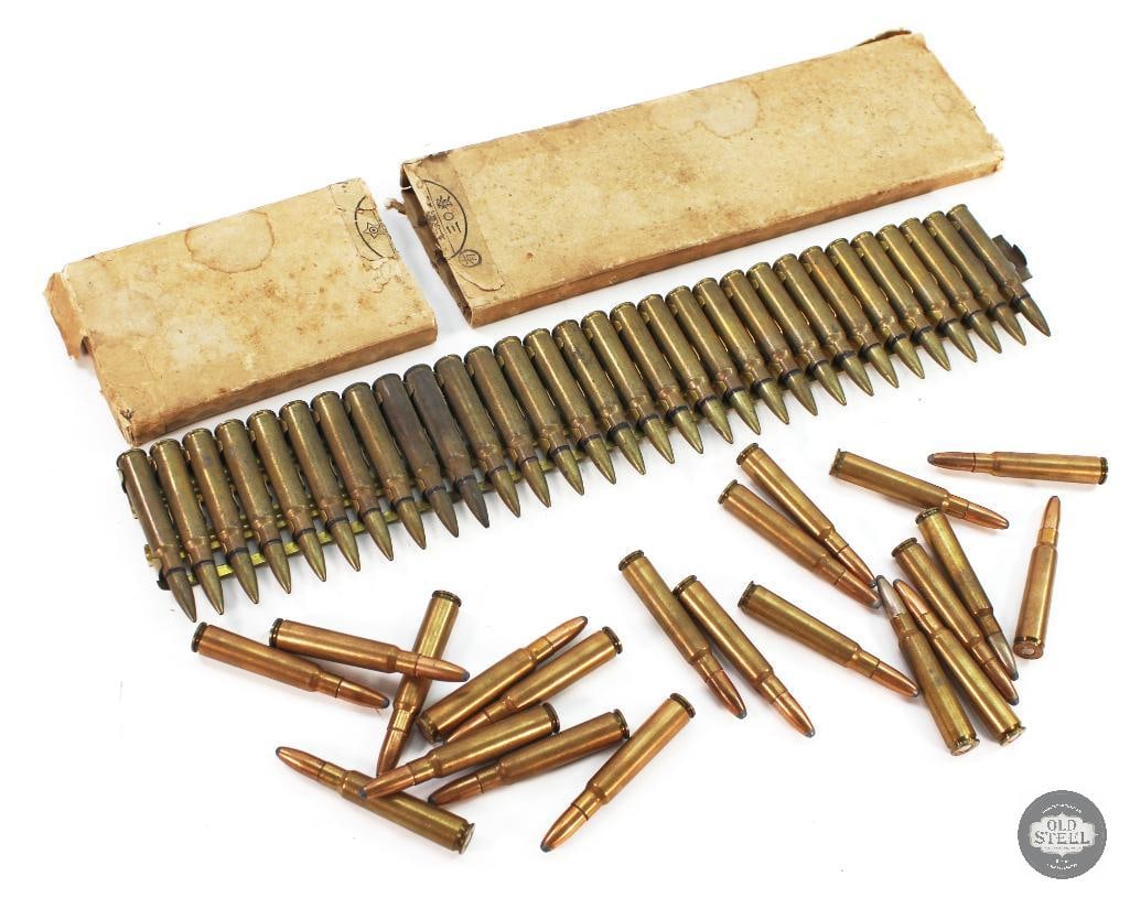 Type 92 7.7 Japanese Machine Gun Ammunition plus 20rds Loose Rifle Loads: Type 92 7.7 Japanese machine gun Ammunition on Rack in Box - 30rds 20rds loose rifle ammunition. 50rds total. THIS ITEM IS AS PICTURED WITH N