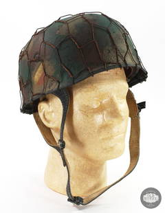 German Paratrooper M38 Helmet Fallshirmjager WWII: Have a look at this German M38 Fallschirmjager WWII helmet. The shell is original with the paint and hardware being refurbished. THIS ITEM IS AS PICTURED WITH NO FURTHER
