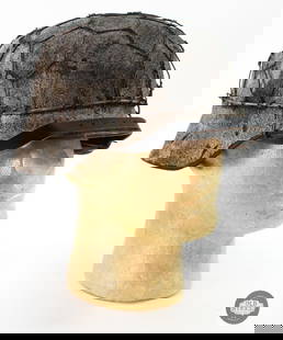 WWII German M40 Winter Camo Helmet: A German M40 refurbished helmet with a fresh winter camouflage paint job, chicken wire wrap and interior liner. The shell is original! THIS ITEM IS AS PICTURED WITH NO FURTHER