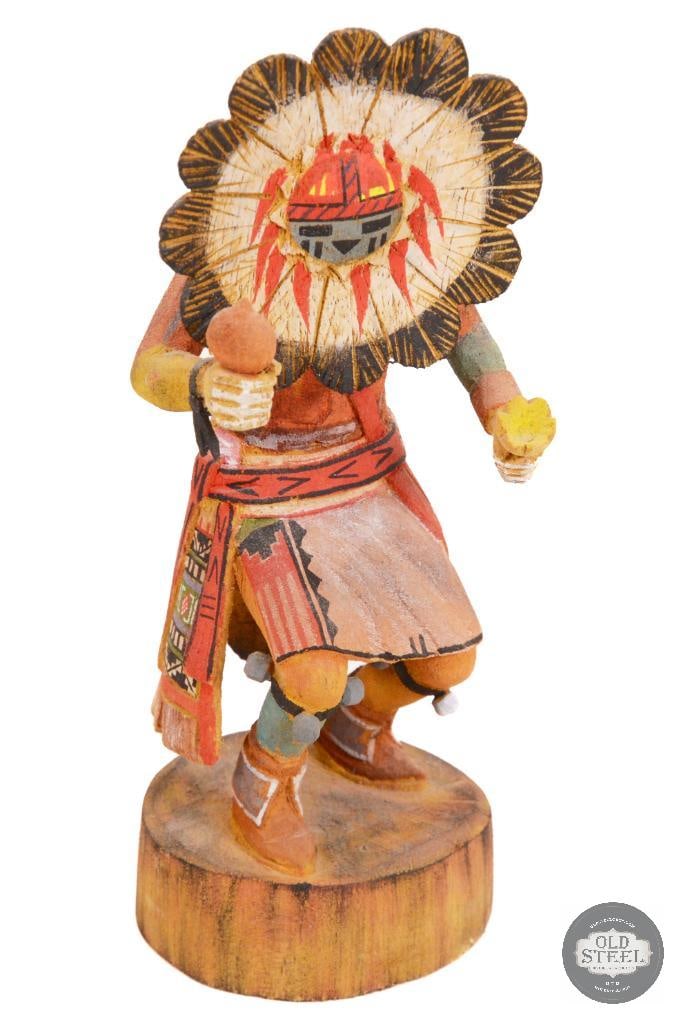 Authentic Hopi Sunface Kachina Doll: A traditionally carved Kachina Sunface doll signed Tsunali on the bottom. Stands about 8 inches high. THIS ITEM IS AS PICTURED WITH NO FURTHER A