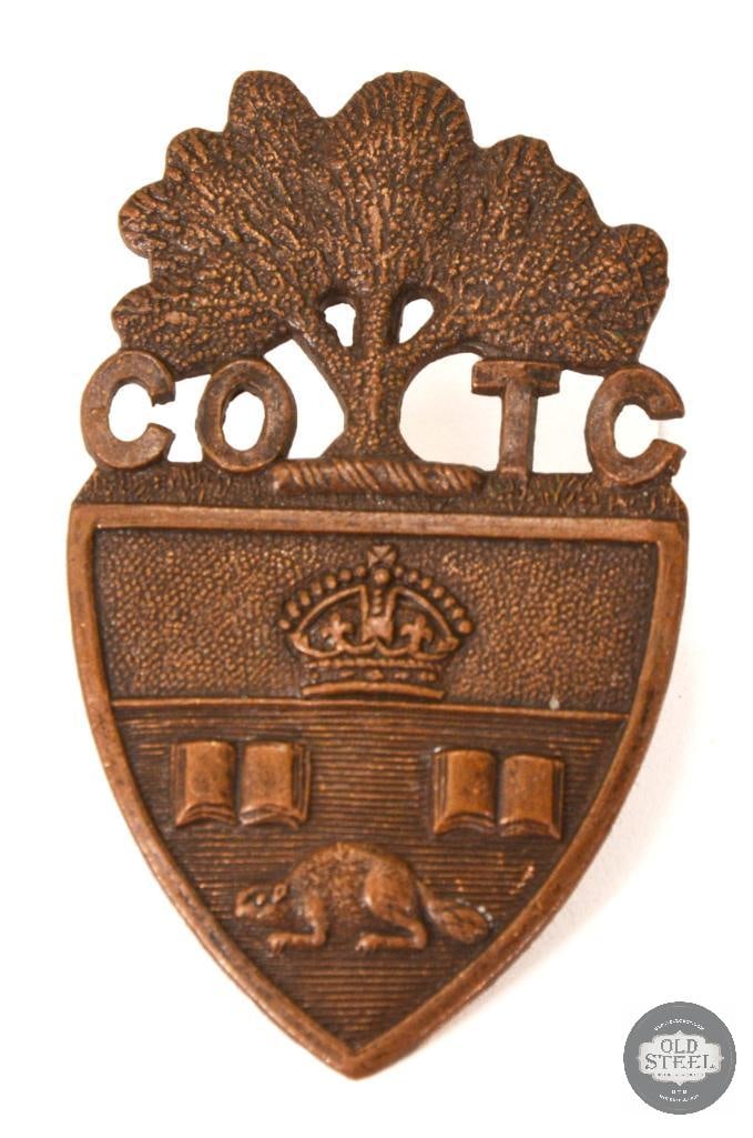 Canadian Officers' Training Corps (COTC) Cap Badge - WWI-WWII Era: The item shown in the image is a Canadian Officers' Training Corps (COTC) cap badge for the University of Toronto contingent. the badge was worn by officer cadets at the University of Toront