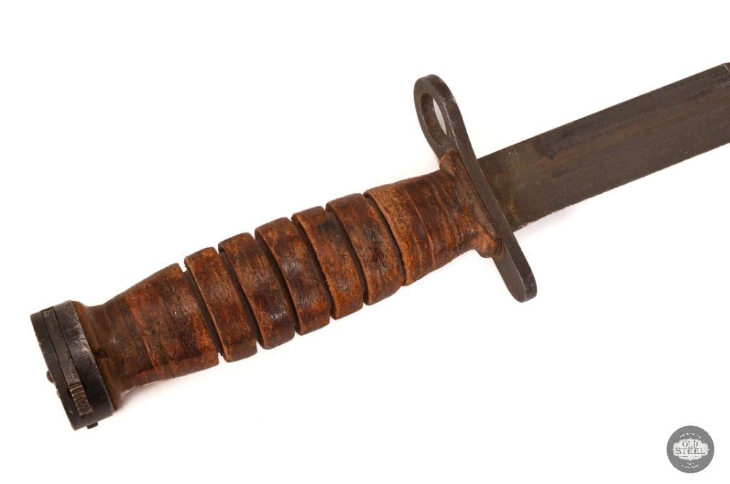 US Utica M4 M1 Carbine Bayonet with Scabbard - WWII: US M4 bayonet for the M1 Carbine by Utica Cutlery. WWII era THIS ITEM IS AS PICTURED WITH NO FURTHER ATTACHMENTS. ALL SALES ARE FINAL. PLEASE REFER TO