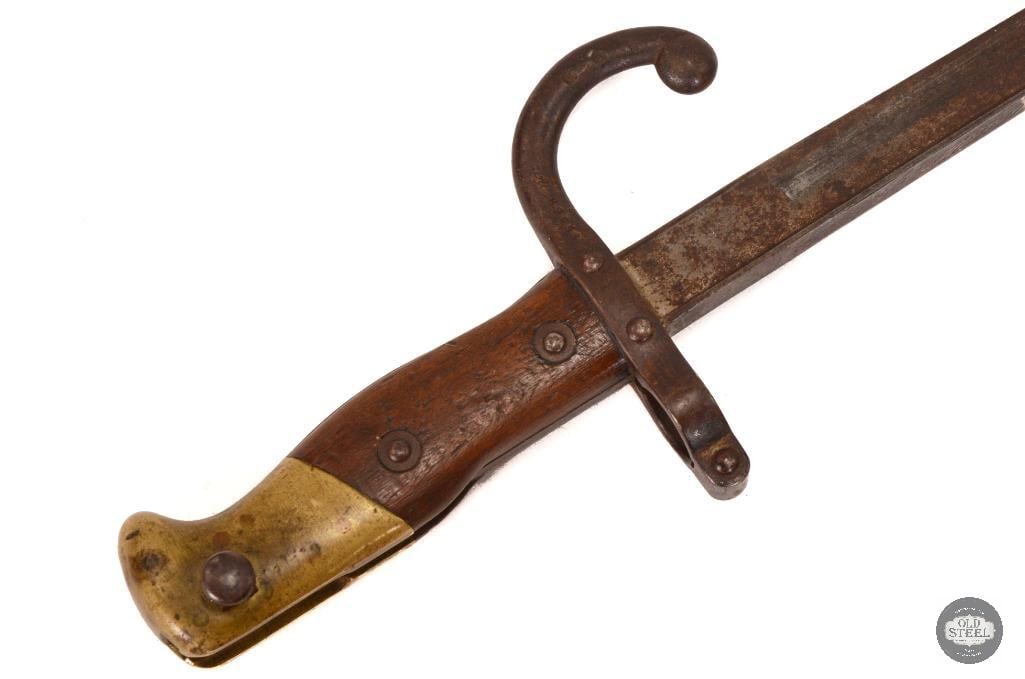 French M1874 T-Back Bayonet - Mfg 1876: French M1874 T-Back Bayonet - Mfg 1876 THIS ITEM IS AS PICTURED WITH NO FURTHER ATTACHMENTS. ALL SALES ARE FINAL. PLEASE REFER TO THE AUCTION DESCRIPT