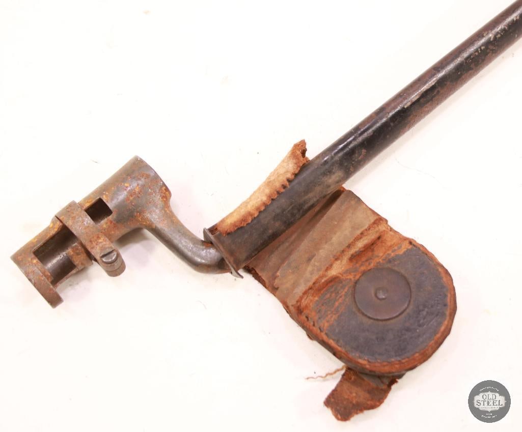Remington M1866/71 Rolling Block Bayonet with Scabbard and Hanger Remnants: A Remington 1866/71 bayonet for rolling block rifles. No visible markings. Blade is 18 inches long and 3/4in wide. Leather hanger is tattered and just a remnant of its full form. 
