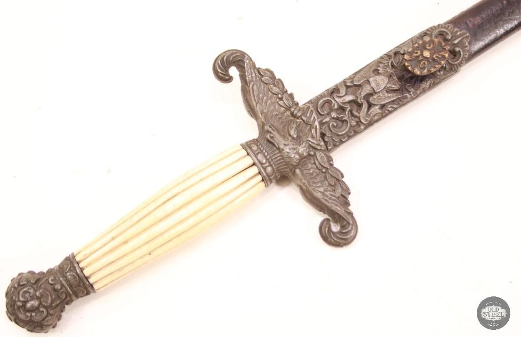 US Non Commissioned Officer Sword c.1850-1870 with Scabbard: Up next is a small straight bladed NCO sword with scabbard from 1850s-1870s. Patina is present and expected. The only visible marking is at the ricasso: MADE IN GERMANY with what could be a bear just