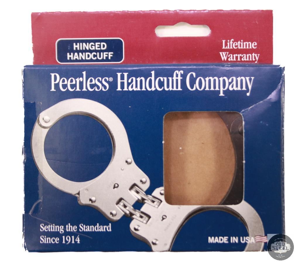 Peerless Handcuff Company Black Hinged Handcuffs: Peerless Handcuff Company black hinged handcuffs, new in box. Professional-grade restraint set manufactured for law enforcement duty use. THIS ITEM IS AS PICTURED WITH NO FURTHER