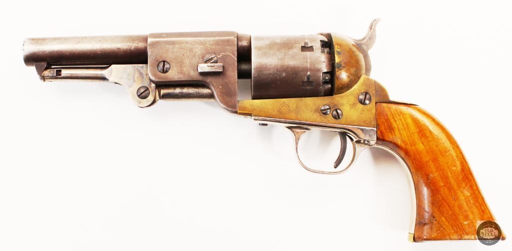 UbertiNavy Arms Co. 1851 Single Action Antique: Uberti Navy Arms Co. 1851 single action with brass frame and grip, nickled trigger guard. Marked .36 cal black powder only. Color case hardened seating rod, round profile barrel. Action cycl