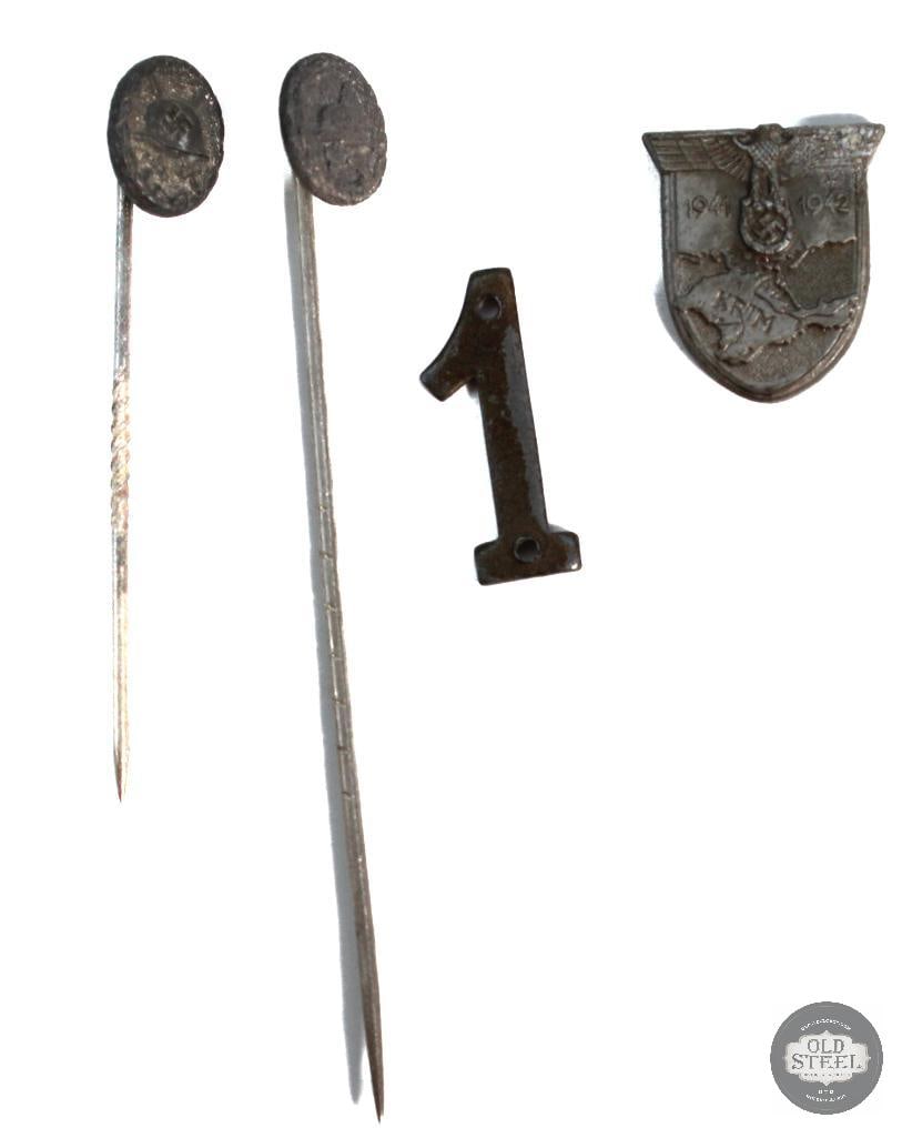 Grouping of Original German WWII medals: Original german Wermarch Krim Shield badge and 2 Wound badge stick pins in black THIS ITEM IS AS PICTURED WITH NO FURTHER ATTACHMENTS. ALL SALES ARE FINAL.