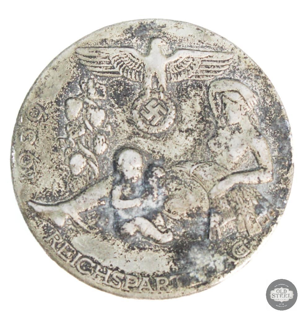 1939 Reichspartei propaganda medal made by RZM WWII German: 1939 Reichspartei propaganda medal made by RZM THIS ITEM IS AS PICTURED WITH NO FURTHER ATTACHMENTS. ALL SALES ARE FINAL. PLEASE REFER TO THE AUCTION DESCRIPTION, LOT #1 DESCRIPTION