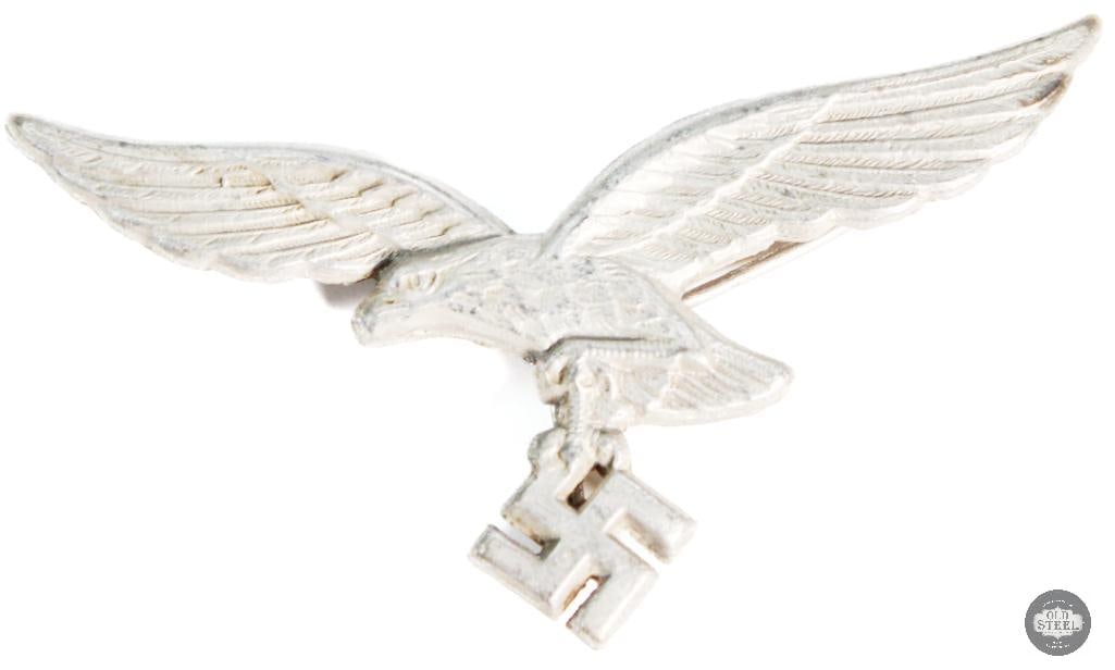 Luftwaffe hat eagle from officer visor capWWII german: Luftwaffe hat eagle from officer visor cap WWII german THIS ITEM IS AS PICTURED WITH NO FURTHER ATTACHMENTS. ALL SALES ARE FINAL. PLEASE REFER TO