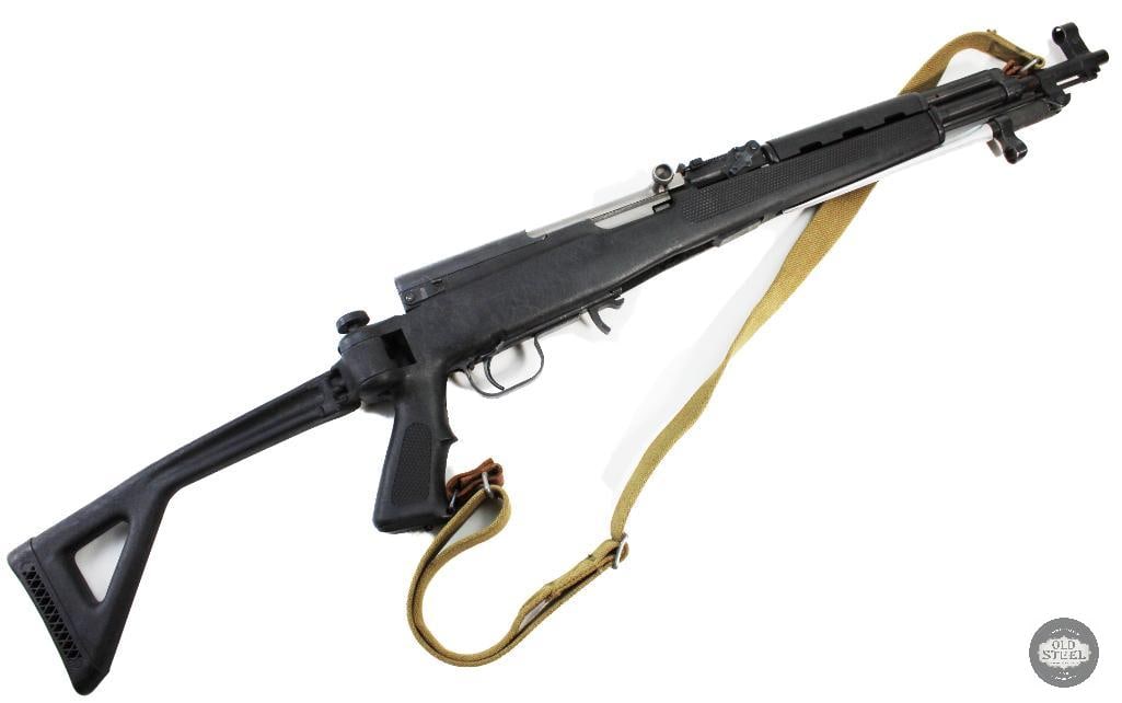 Norinco SKS 16.5 Inch Barrel W/ Side Folding Stock: Up for Auction is a Norinco SKS Chambered in 7.62x39 the barrel has been shortened to 16.5 inches and has a sharp reflective bore. The stock has a length of pull measures in at 14.5 inches and folds