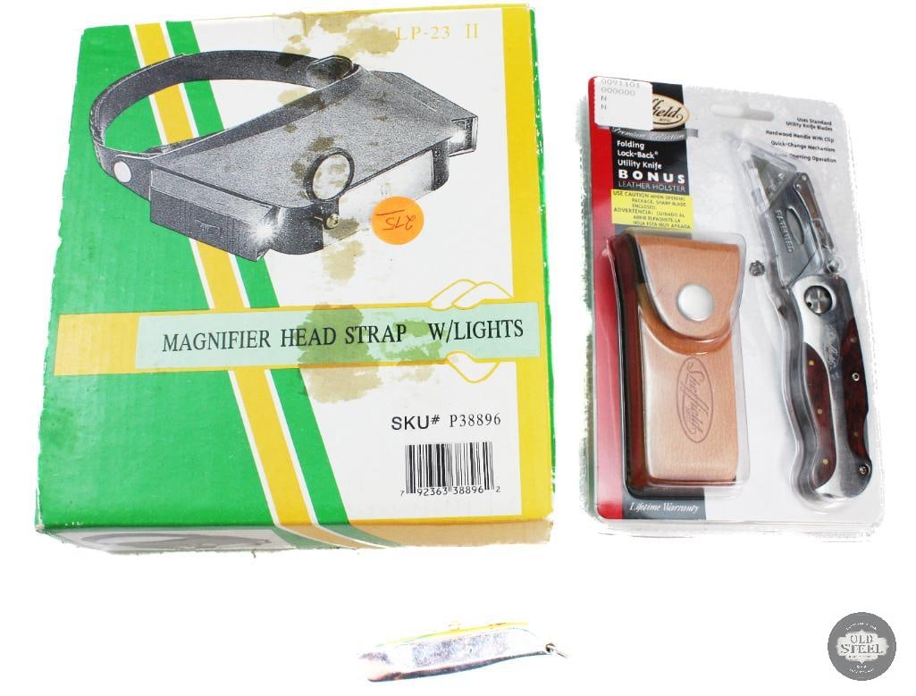Lot of 2 Box Cutters & Head Mounted Magnifier: Lot of 2 Box Cutters & Head Mounted Magnifier THIS ITEM IS AS PICTURED WITH NO FURTHER ATTACHMENTS. ALL SALES ARE FINAL. PLEASE REFER TO THE AUCTION DESCRIPTION, LOT #1 DESCRIPTION