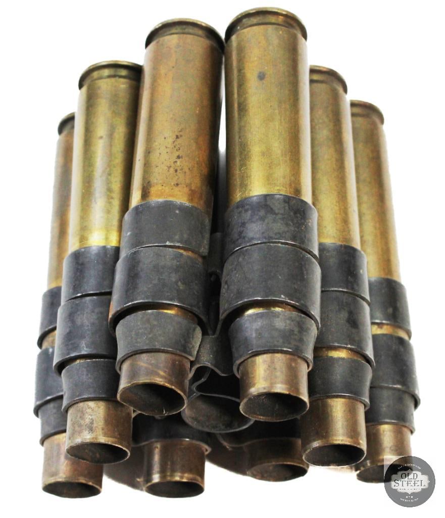 8 Casings of Linked .50 BMG: 8 Casings of Linked .50 BMG THIS ITEM IS AS PICTURED WITH NO FURTHER ATTACHMENTS. ALL SALES ARE FINAL. PLEASE REFER TO THE AUCTION DESCRIPTION, LOT #1 DESCRIPTION AND TERMS OF SALE