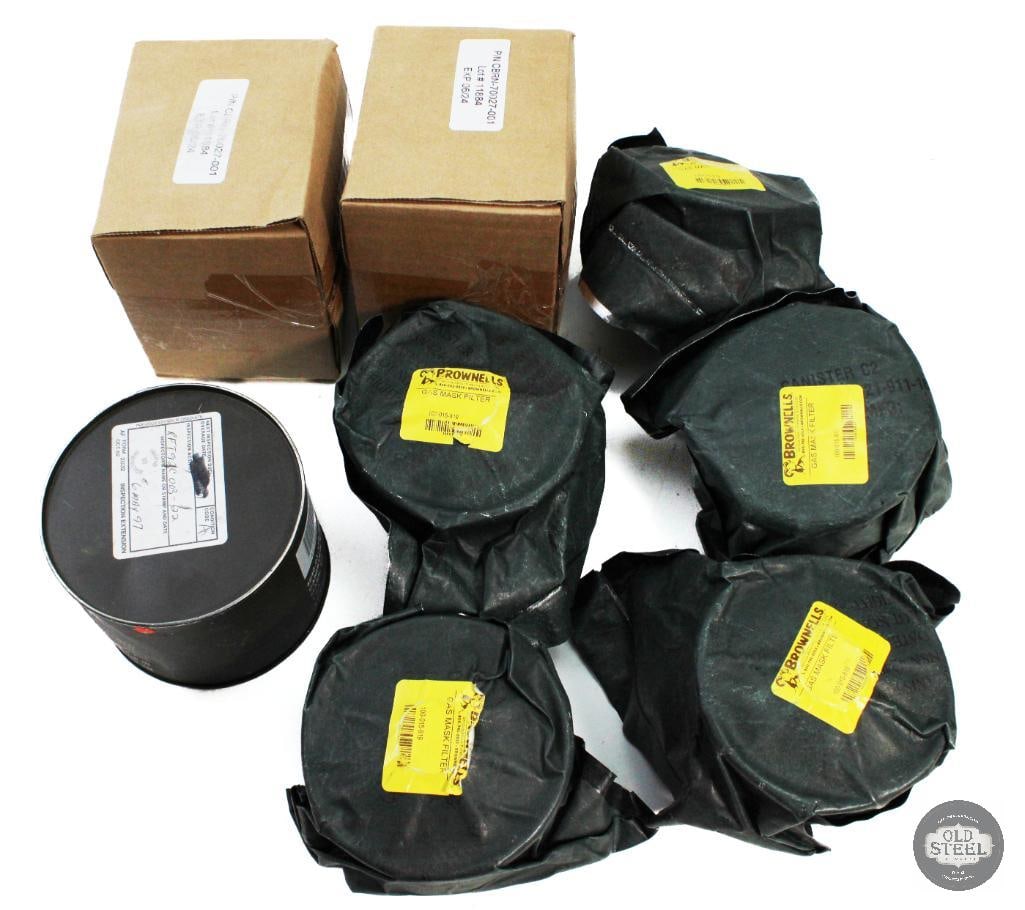 Lot of 9 Misc. Gas Mask Filters. M13A2 & 40 MM: Lot of 9 Misc. Gas Mask Filters. M13A2 & 40 MM THIS ITEM IS AS PICTURED WITH NO FURTHER ATTACHMENTS. ALL SALES ARE FINAL. PLEASE REFER TO THE AUCT