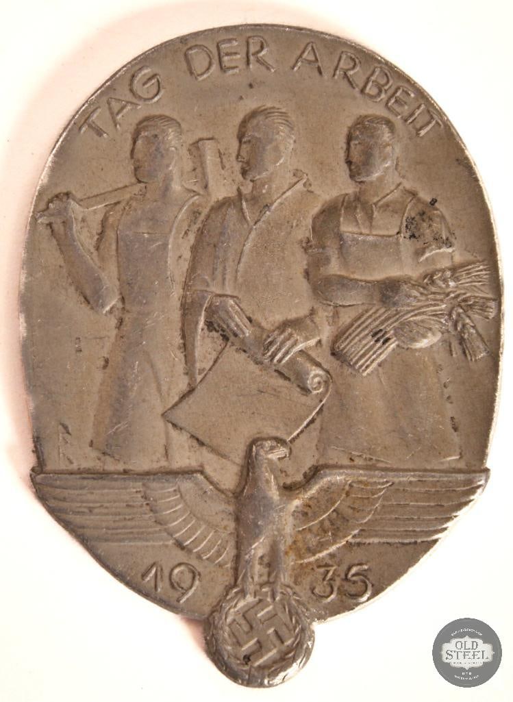 1935 Tag Der Arbeit Tinnie - Pre WWII Germany: 1935 Tag Der Arbeit Tinnie - Pre WWII Germany THIS ITEM IS AS PICTURED WITH NO FURTHER ATTACHMENTS. ALL SALES ARE FINAL. PLEASE REFER TO THE AUCTION DESCRIPTION, LOT #1 DESCRIPTION AND