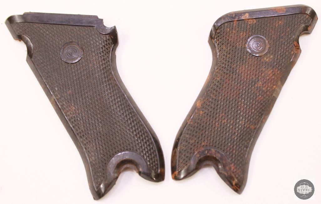 Original Bakelite East german Volkspolizei P.08 Grips: Original Bakelite East german Volkspolizei P.08 Grips THIS ITEM IS AS PICTURED WITH NO FURTHER ATTACHMENTS. ALL SALES ARE FINAL. PLEASE REFER TO THE AUCTION DESCRIPTION, LOT