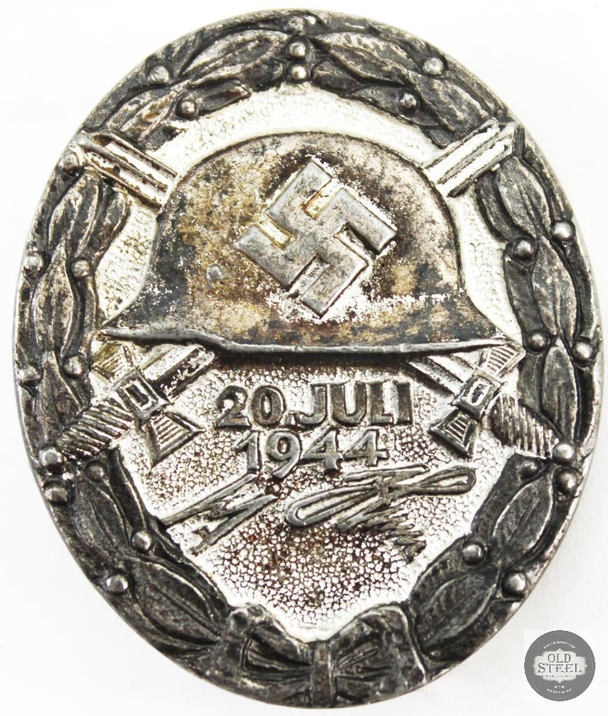 Original German Silver Wound Badge 20 July 1944 WWII: Original German Silver Wound Badge 20 July 1944 WWII THIS ITEM IS AS PICTURED WITH NO FURTHER ATTACHMENTS. ALL SALES ARE FINAL. PLEASE REFER TO THE AUCTION DESCRIPTION, LOT #1 DESCRIPTION