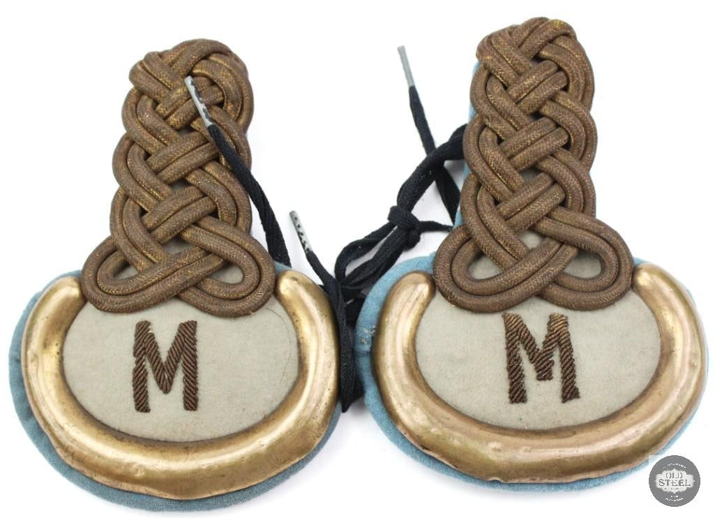US Military Shoulder Epaulettes - M Embroidery: US Military shoulder epaulettes from late 1800s to early 1900s. M Embroidery likely denoting regiment. THIS ITEM IS AS PICTURED WITH NO FURTHER ATTACHMENTS. ALL SALES ARE FINAL. PLEASE REFER