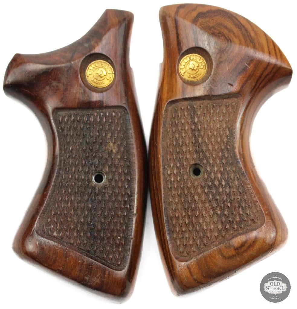 Taurus Medium Revolver Wooden Grips: Taurus Medium Revolver Wooden Grips THIS ITEM IS AS PICTURED WITH NO FURTHER ATTACHMENTS. ALL SALES ARE FINAL. PLEASE REFER TO THE AUCTION DESCRIPTION, LOT #1 DESCRIPTION AND TERMS OF