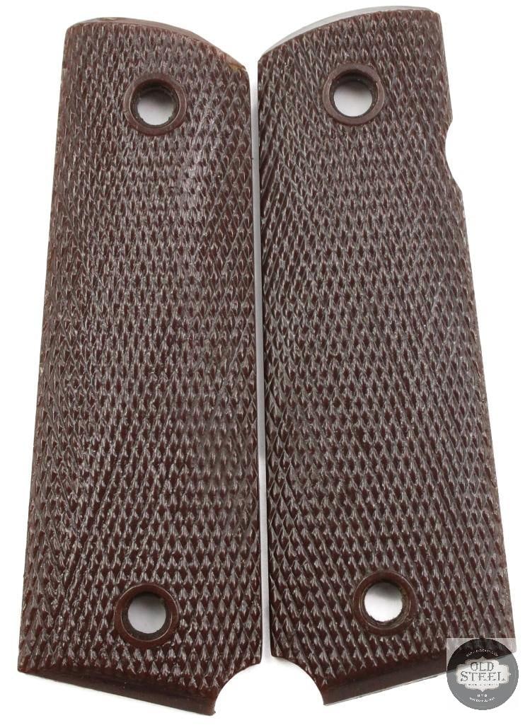 USGI Brown Plastic 1911 Grips: USGI Brown Plastic 1911 Grips THIS ITEM IS AS PICTURED WITH NO FURTHER ATTACHMENTS. ALL SALES ARE FINAL. PLEASE REFER TO THE AUCTION DESCRIPTION, LOT #1 DESCRIPTION AND TERMS OF SALE