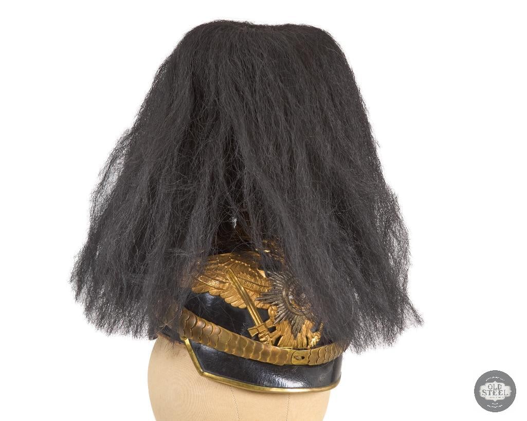 RARE Original Imperial German Officer's Pickelhaube with Parade Bush: RARE Original Imperial German Officer's Pickelhaube with Parade Bush. Intact cloth and leather liner. Laquer paint is flaking off on the rear portion where the leather has shrunk more than in the