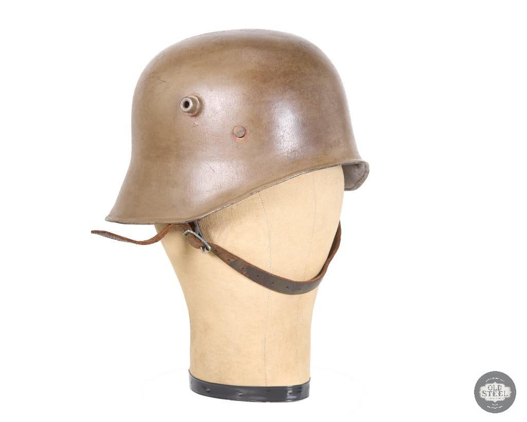 M1918 Visorless Helmet - SI 62 Eisenhutte Silesia: This M1918 visorless helmet is a rare late-war German Stahlhelm with strong originality and excellent collector appeal. Eisenhutte Silesia of Paruschowitz, Oberschlesien produced this example, and