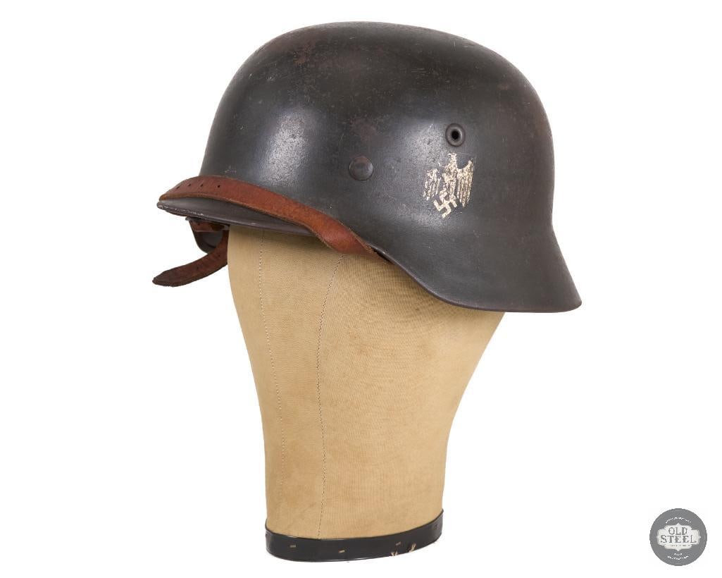 Original Heer M40 German Single Decal Helmet WWII: Original German Heer M40 helmet with chinstrap and liner. Chinstrap makers mark is well preserved showing: VOEGELS KOLN 1940. Shell is marked NS64 and 0136. THIS ITEM IS AS PICTURED WITH NO